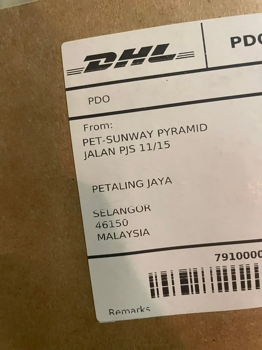 A DHL label on a ZARA parcel, with the sender address reading PET-Sunway Pyramid, Petaling Jaya, Selangor